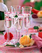 Champagne glasses with name tags