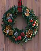 Door wreath with apples and orange slices