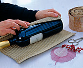 Wine bottles as a gift (1/3). Roll bottle in corrugated cardboard