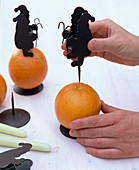 Father Christmas candle holder with oranges (1/2)