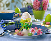 Breakfast egg with bow, Hyacinthus (hyacinth flowers), sugar eggs