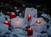 Ice stars as lanterns from water poured into moulds