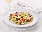 Cavatelli pasta with clams and artichokes