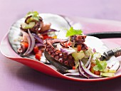 Octopus and vegetable salad with chili, coriander and peppers