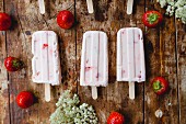 Buttermilk and strawberry ice lolly