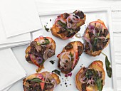 Italian chicken liver crostini with grilled apples and sage