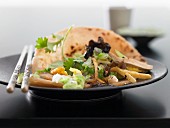 Mu shu tofu in pancakes with cabbage and mushrooms