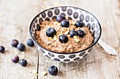 Lupine porridge with dried fruits and blueberries