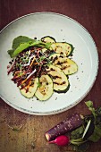 Grilled courgette slices with lentil salad