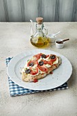 Focaccia with mozzarella, tomatoes and olives