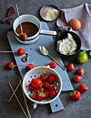 Ingredients for chocolate fondue with strawberries (low carb)