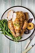 Roasted chicken with green beans and herbs
