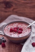 Chocolate porridge with raspberries