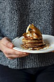Pancakes with poached pears, maple syrup and bee pollen