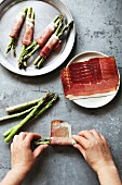 Making ham wrapped asparagus