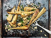 Baked parsnips with almonds and rosemary
