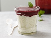 Lactose-free rice pudding with berry sauce