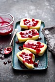 Mini cheesecakes with pomegranate compote