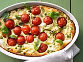 Clafoutis with tomatoes, peas, ricotta and basil