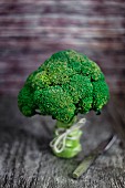 Broccoli on wooden surface