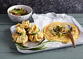 Pancake parcels filled with mushrooms and spring onions