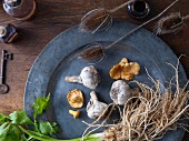 Still-life arrangement on pewter plate