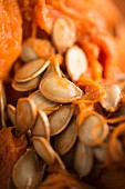 Many fresh pumpkin seeds (close up)