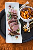 Sliced pork fillet with butternut squash