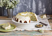 Lemon and poppy cake with pistachios, sliced