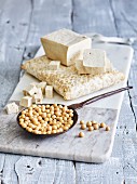Tofu and soya beans on a marble board