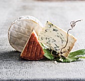 Three Assorted Cheeses on a White Background