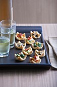 Hors d'oeuvres and glasses on tray