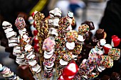 Marshmallow kebabs with chocolate and sugar sprinkles