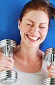 Woman working out with dumbbells