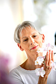 Woman arranging flowers