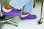 Nurse with plastic shoes
