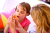 Child using an aerosol inhaler
