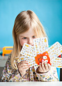 Girl playing cards