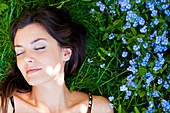 Woman resting on grass