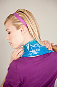 Woman using a gel pack
