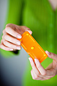 Woman holding morning-after pill