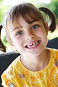 Girl with milk teeth