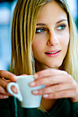 Woman drinking coffee