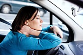 Driver suffering from neck pain