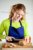 Woman eating bread