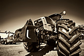 Tractor with wheel in foreground