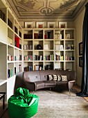 Old ceiling fresco and modern furniture in living room