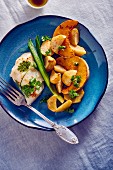 Cod fillet with pumpkin wedges and potatoes