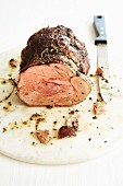 Pink roast lamb cooked at a low temperature