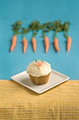Carrot Cupcakes with Cream Cheese Frosting; On Platter